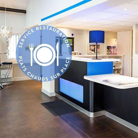 Hotel Ibis Budget Nantes Ouest Atlantis Couëron Exterior foto