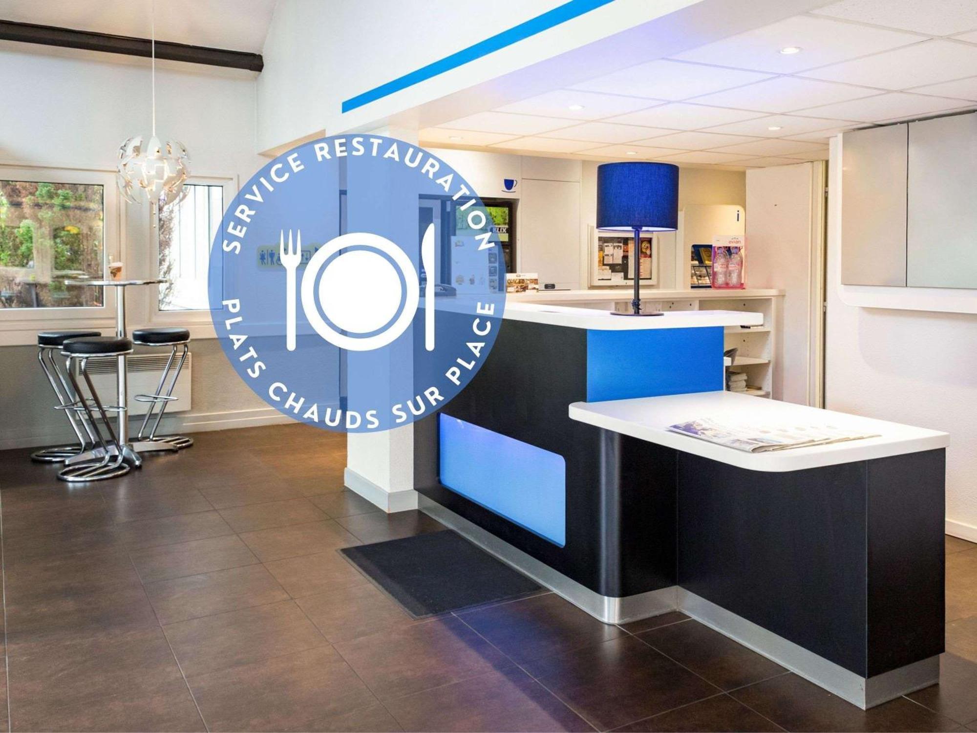 Hotel Ibis Budget Nantes Ouest Atlantis Couëron Exterior foto