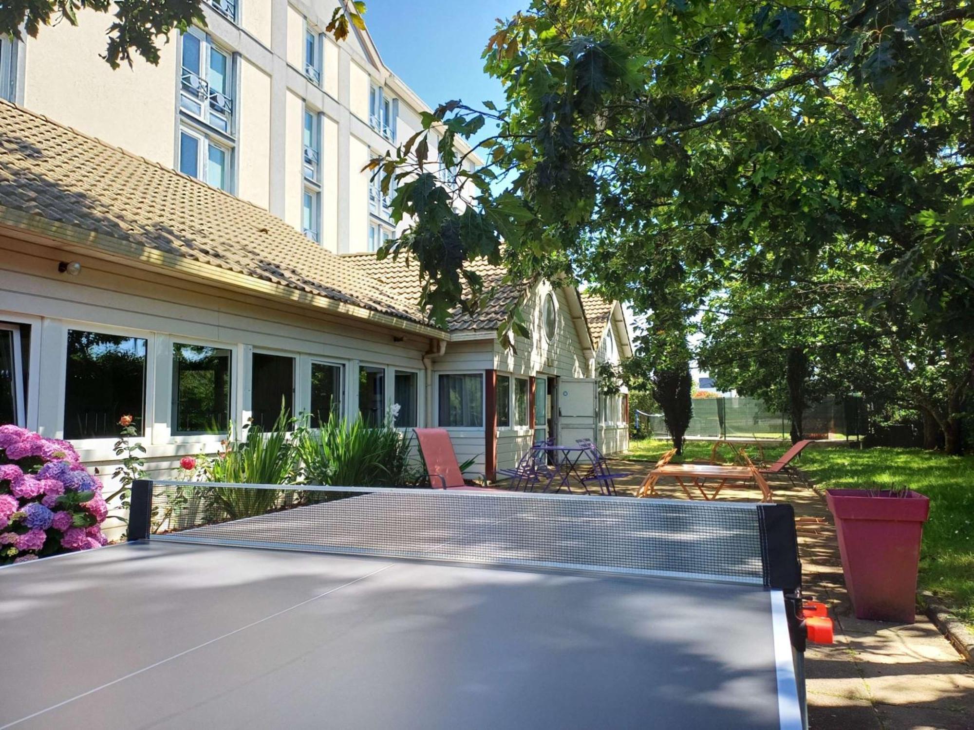 Hotel Ibis Budget Nantes Ouest Atlantis Couëron Exterior foto